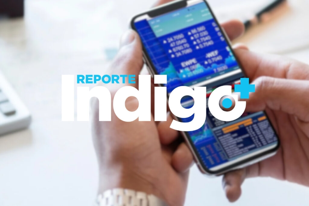 Reporte Indigo logo on top of a person holding a phone